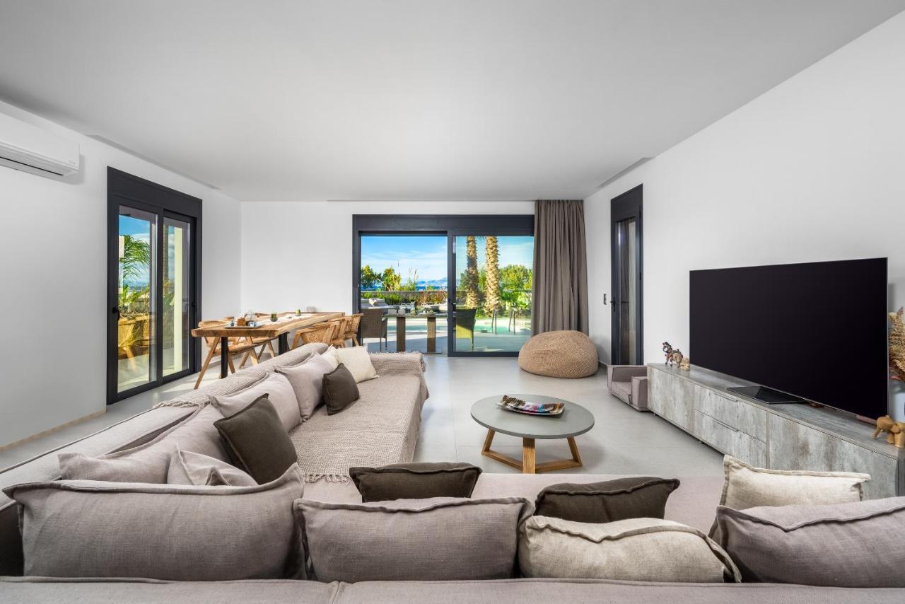 Penelope Beachfront Villa Кремасти Экстерьер фото
