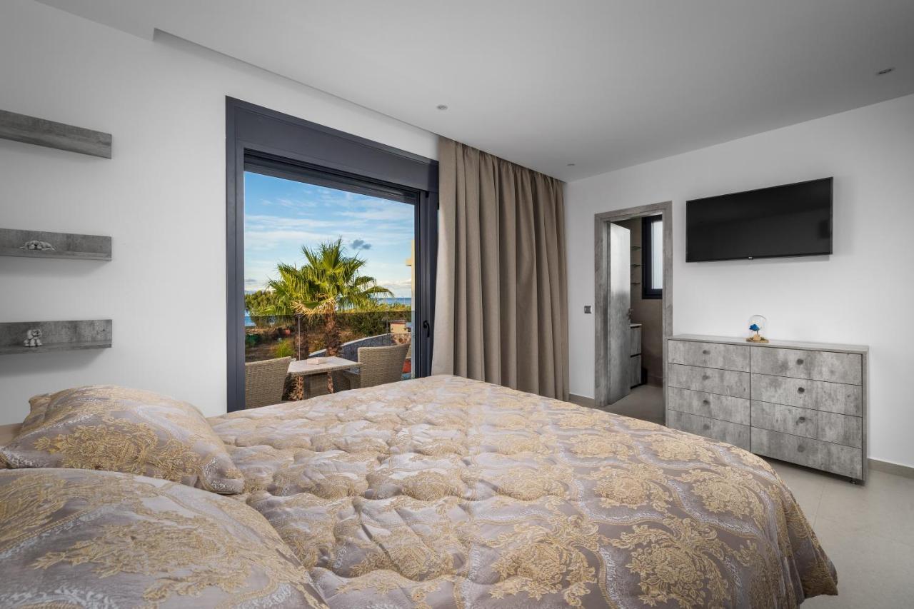 Penelope Beachfront Villa Кремасти Экстерьер фото