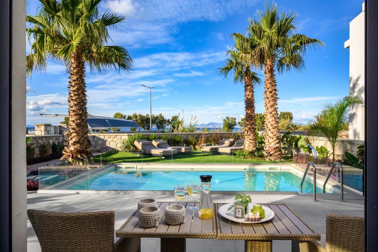Penelope Beachfront Villa Кремасти Экстерьер фото