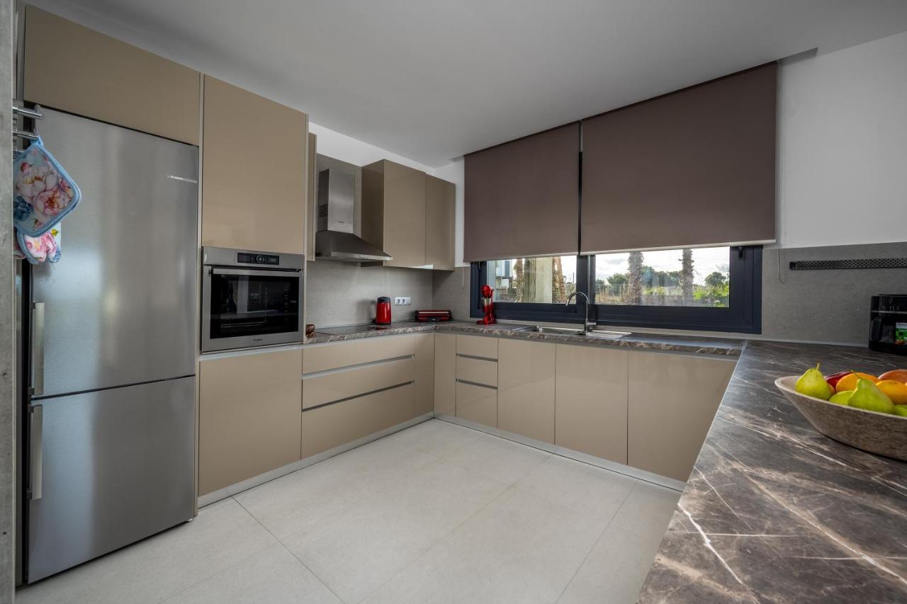 Penelope Beachfront Villa Кремасти Экстерьер фото