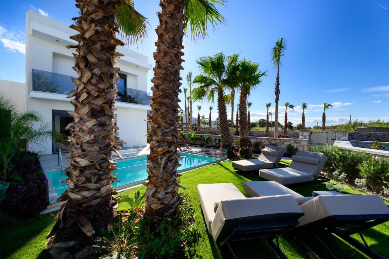 Penelope Beachfront Villa Кремасти Экстерьер фото