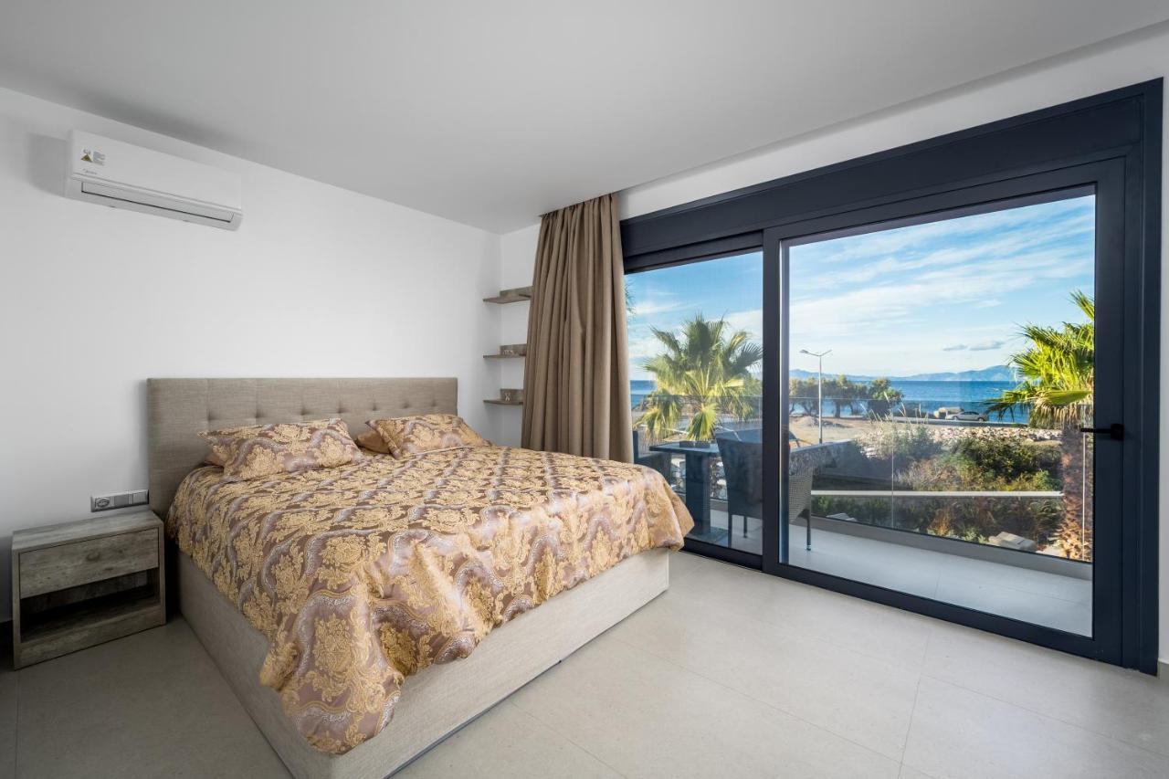 Penelope Beachfront Villa Кремасти Экстерьер фото