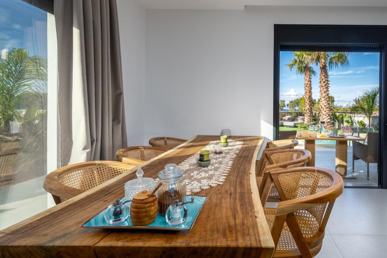 Penelope Beachfront Villa Кремасти Экстерьер фото