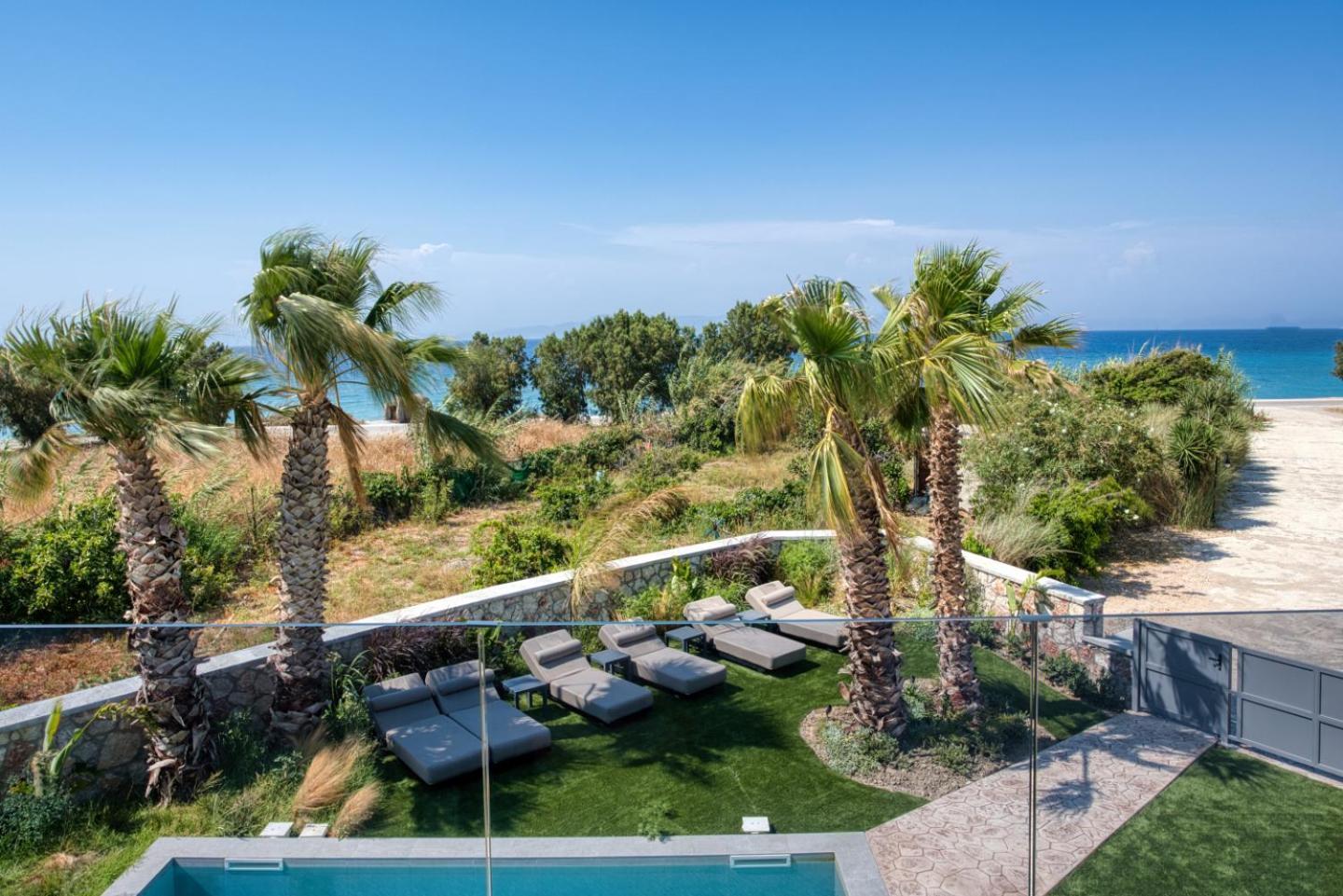 Penelope Beachfront Villa Кремасти Экстерьер фото